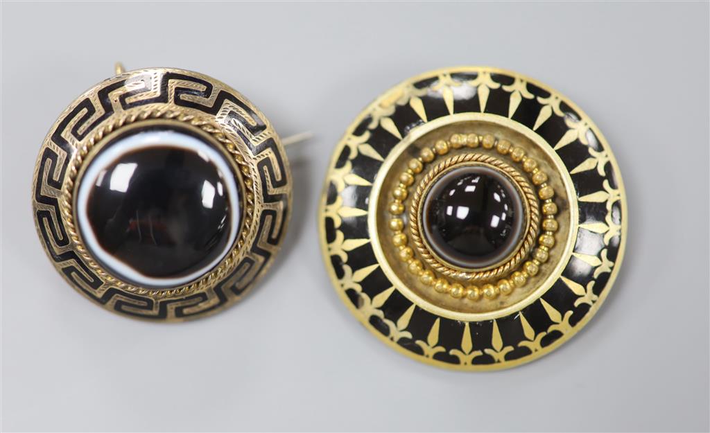 A Victorian yellow metal, enamel and cabochon banded agate set mourning pendant brooch, 30mm & 1 other.